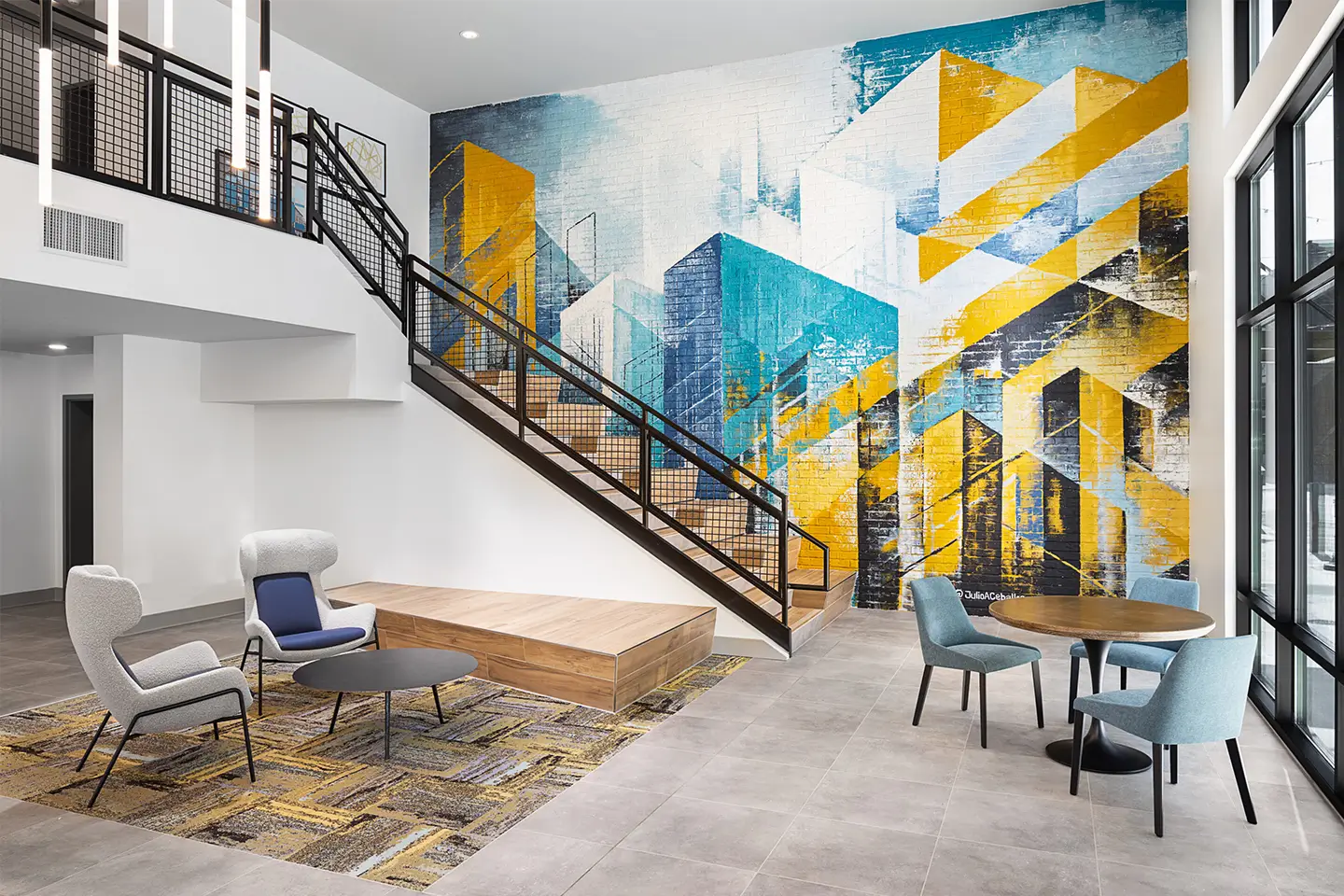 resident lounge with colorful wall mural